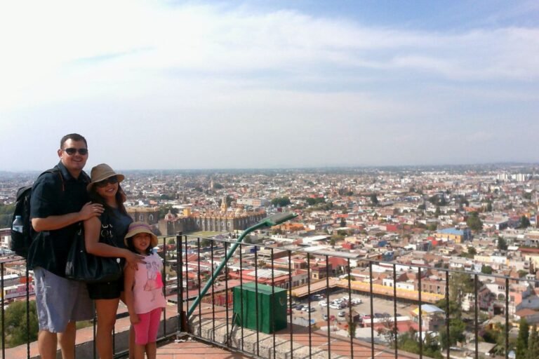 Adrian & Soco with their daughter, Briana, from the top of the Iglesia de Nuestra Señora de los Remedios sanctuary in Cholula, Puebla.
