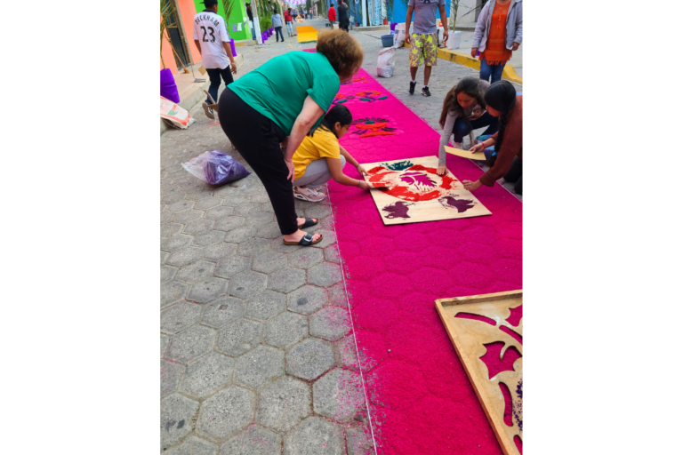 For Holy Week, the La Compañía community creates colorful carpets of sawdust in the streets. On Good Friday, a religious procession walks the carpetas.